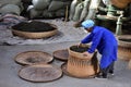 ANHUI PROVINCE, CHINA Ã¢â¬â CIRCA OCTOBER 2017: A man working inside a tea factory Royalty Free Stock Photo